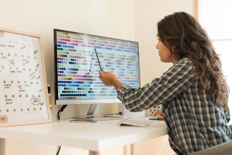 Woman picking colors for design